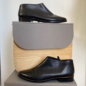 Slight scuff on top of left toe. Probably easily buffed out. Worn only once